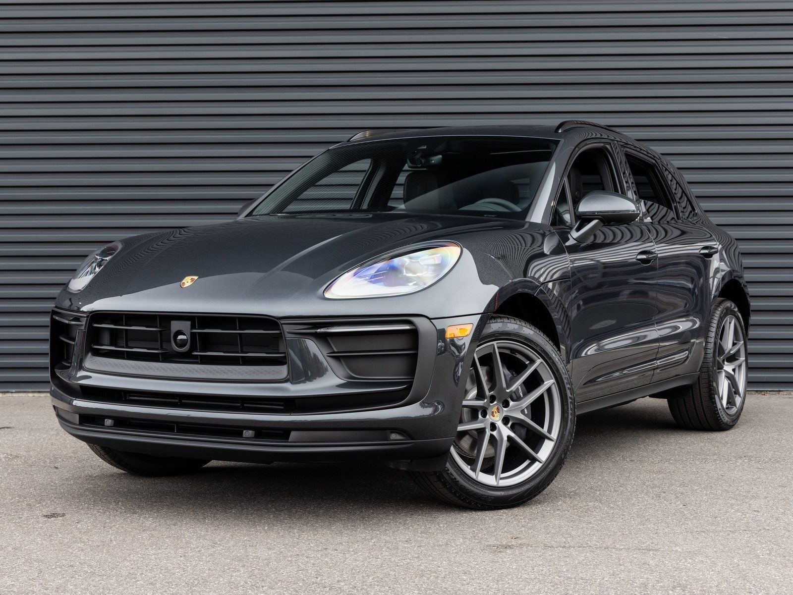 2026 Porsche Macan Macan in Volcano Grey Metallic — front three-quarter view