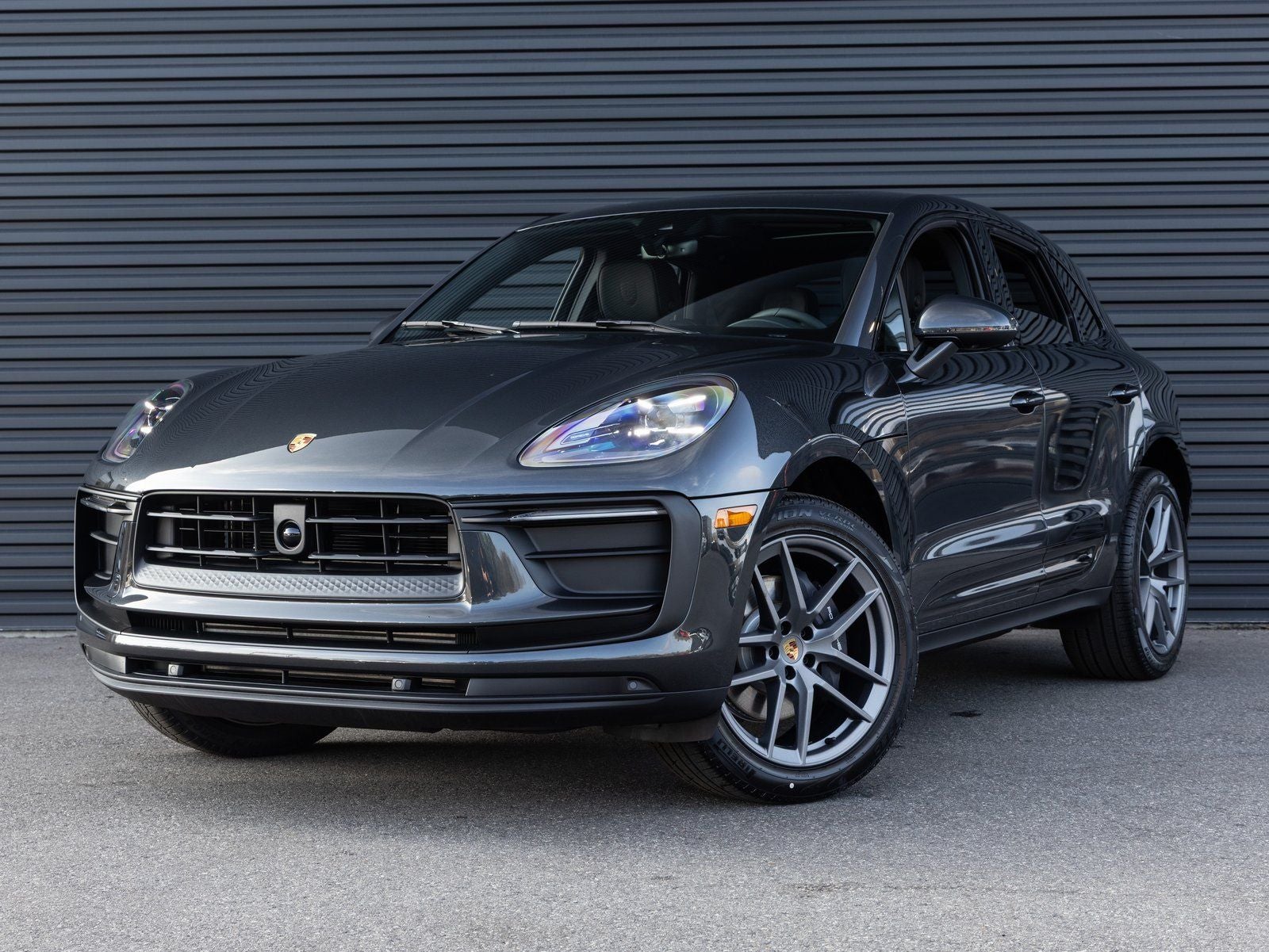 2026 Porsche Macan Macan in Volcano Grey Metallic — front three-quarter view